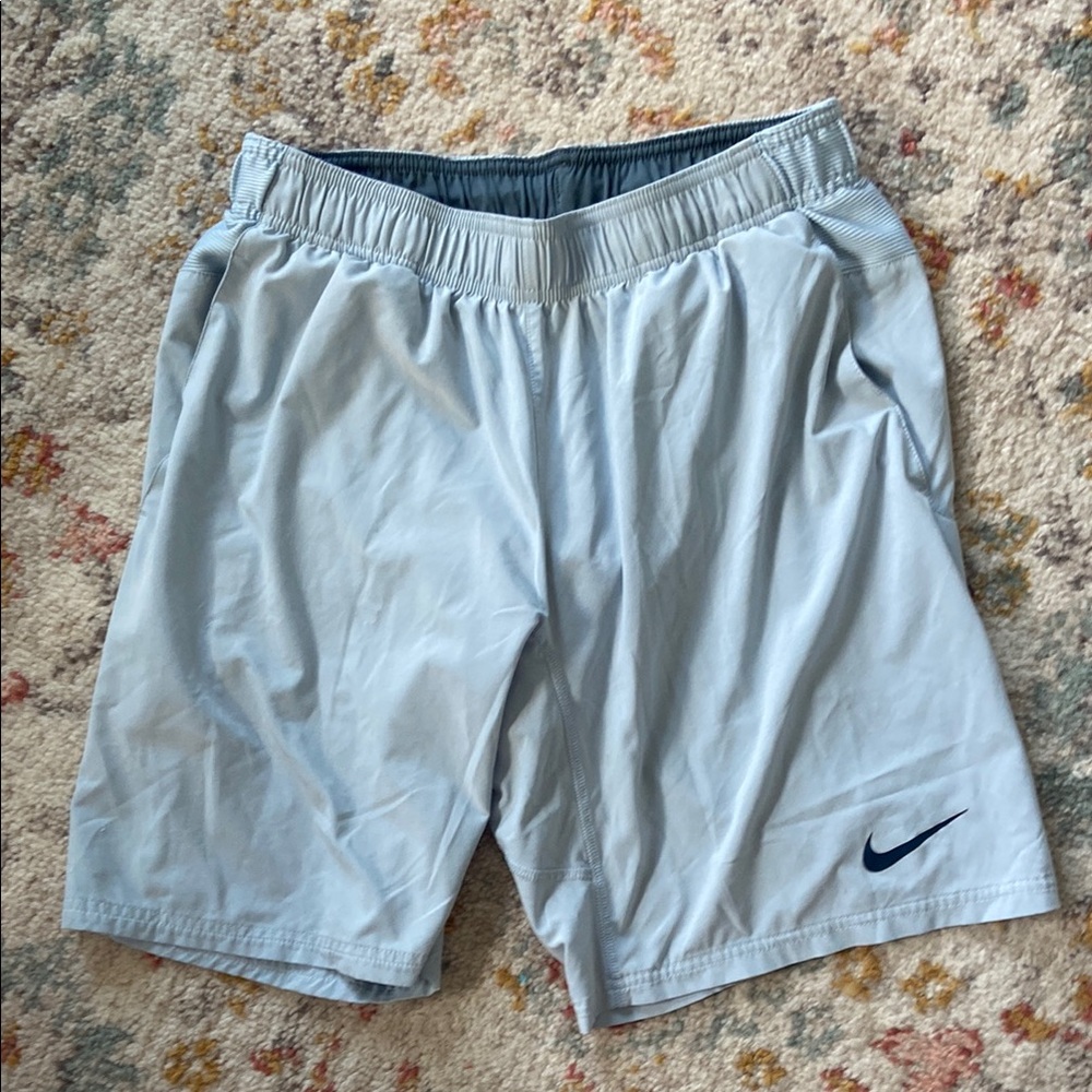 Nike Light Blue Athletic Shorts with Navy Swoosh